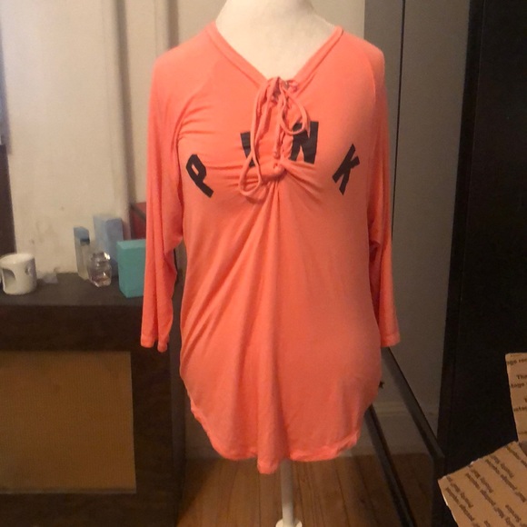 PINK Victoria's Secret Tops - Pink Victoria’s Secret orange top that tied in the center…” pink” is in black